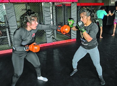 Anita Karim fighter breaks barriers... and arms