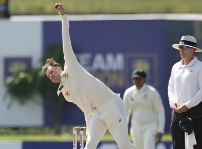 Australia’s Matthew Kuhnemann reported for suspected illegal bowling