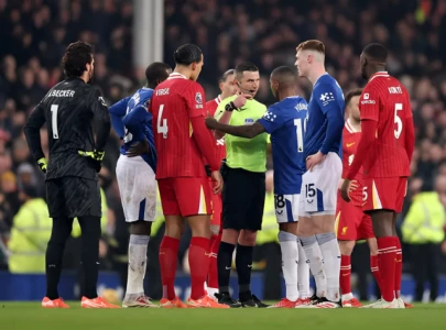 Watch: Chaotic scenes at Liverpool vs Everton as fans invade the pitch