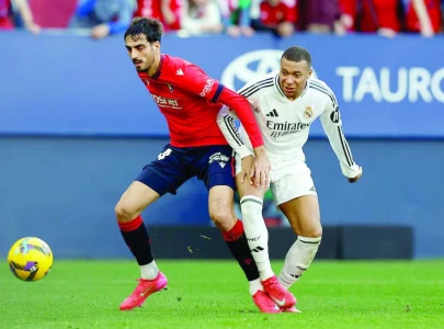 Real Madrid stay top after Atletico draw
