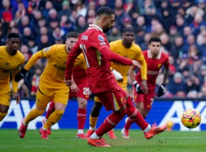 Liverpool vs Wolves 2-1: Salah scores again in tense title scare