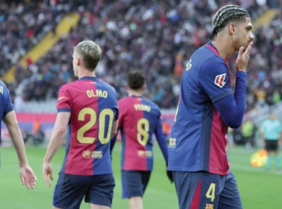 Barca thrash Sociedad to reclaim top spot