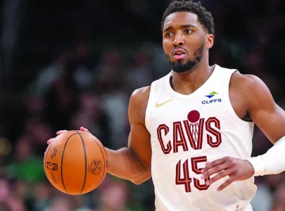 Cavs hold off Heat to book NBA playoff berth