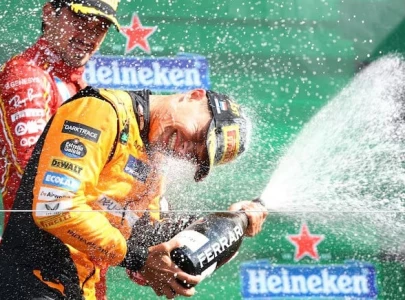 Lando Norris wins rain-affected Australian Grand Prix as Max Verstappen chases and Lewis Hamilton struggles