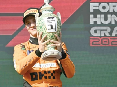 Piastri wins Chinese Grand Prix as Norris survives brake scare for McLaren one-two finish