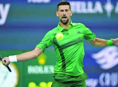 Djokovic eases into Miami quarters
