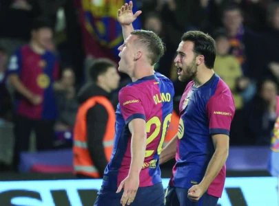 Olmo fires Liga leaders Barca past Mallorca