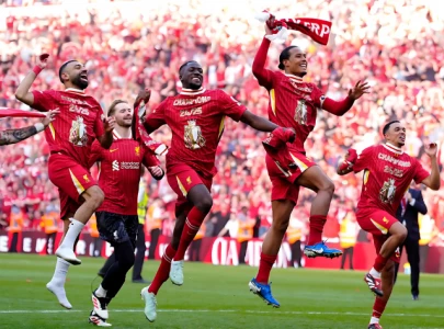 Liverpool tie Manchester United's record by winning Premier League