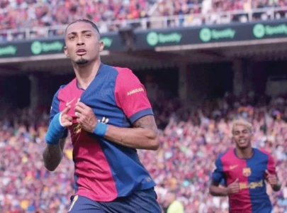 Barca edge Real Madrid in thriller