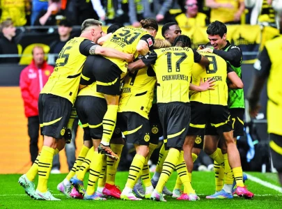 Dortmund complete escape act to snatch UCL berth