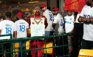 RCB Fans Turn Up In Whites To Pay Tribute To Virat Kohli Despite Heavy Rain