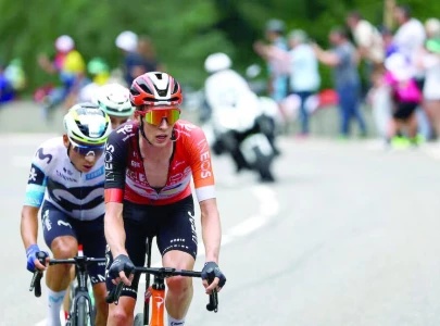 Arensman soloes to Tour stage victory