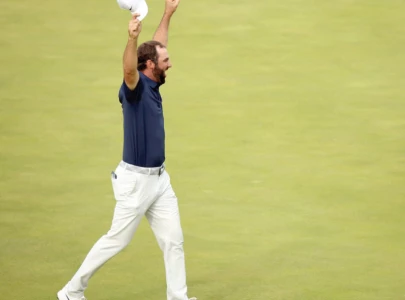 Scheffler cruises to British Open title